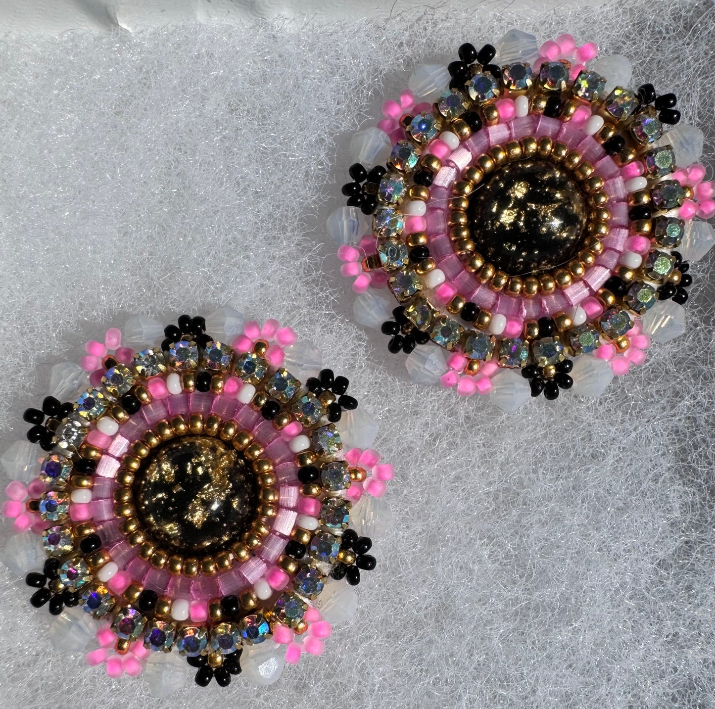Black pinky flower studs